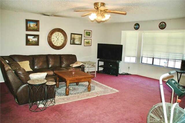 30717 Seminole Dr, Coarsegold, CA 93614 - carpeted living room featuring ceiling fan and a textured ceiling