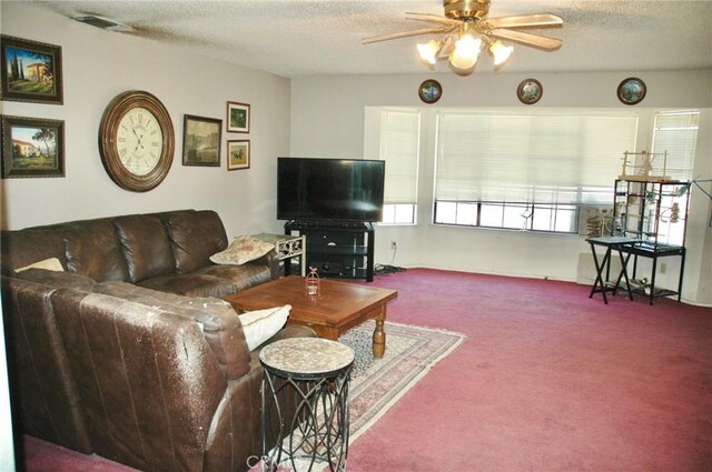30717 Seminole Dr, Coarsegold, CA 93614 - carpeted living room featuring a ceiling fan and a textured ceiling