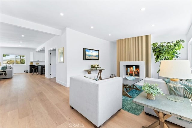 32862 Bluffside Dr, Dana Point, CA 92629 - living area featuring a large fireplace, recessed lighting, and light wood-type flooring