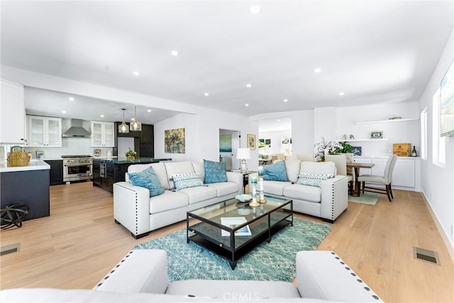32862 Bluffside Dr, Dana Point, CA 92629 - living room featuring light wood-style floors and recessed lighting