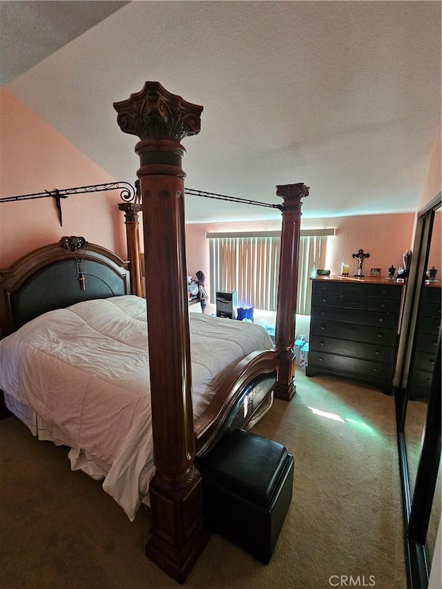 24377 Larchmont Ct Unit 32, Laguna Hills, CA 92653 - bedroom with carpet and decorative columns