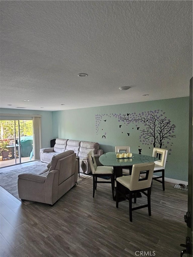 24377 Larchmont Ct Unit 32, Laguna Hills, CA 92653 - living room featuring dark wood finished floors and a textured ceiling