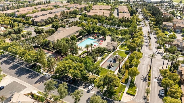 5603 Kate Way Unit 4, Fontana, CA 92336 - aerial view of property's location featuring a pool and nearby suburban area