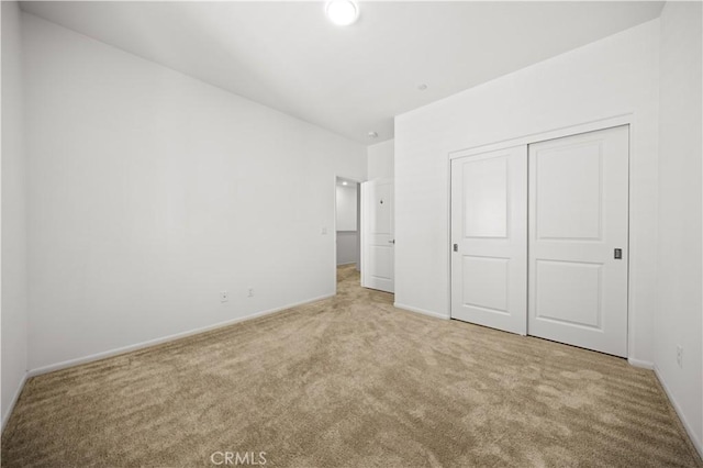 5603 Kate Way Unit 4, Fontana, CA 92336 - unfurnished bedroom featuring carpet flooring and a closet