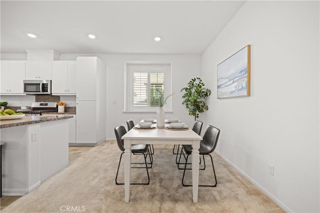 5603 Kate Way Unit 4, Fontana, CA 92336 - dining space featuring recessed lighting and light colored carpet