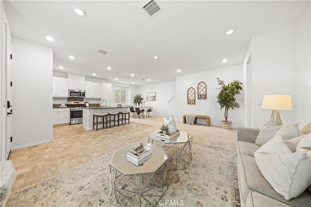 5603 Kate Way Unit 4, Fontana, CA 92336 - living room with recessed lighting