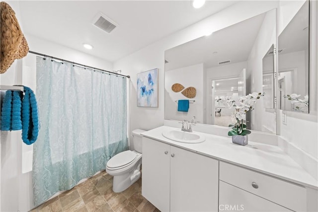 5603 Kate Way Unit 4, Fontana, CA 92336 - bathroom with vanity, stone finish floors, shower / tub combo with curtain, and recessed lighting