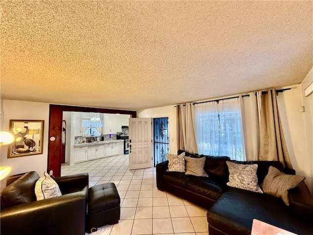 1526 Lakme Ave, Wilmington, CA 90744 - living area with a textured ceiling and light tile patterned floors
