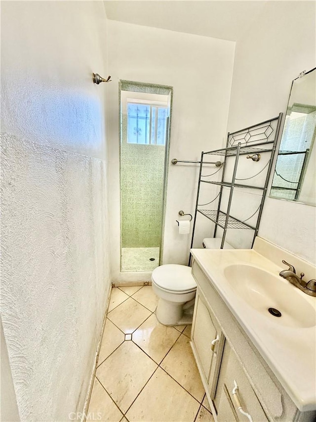1526 Lakme Ave, Wilmington, CA 90744 - full bath featuring tile patterned flooring, a stall shower, and vanity
