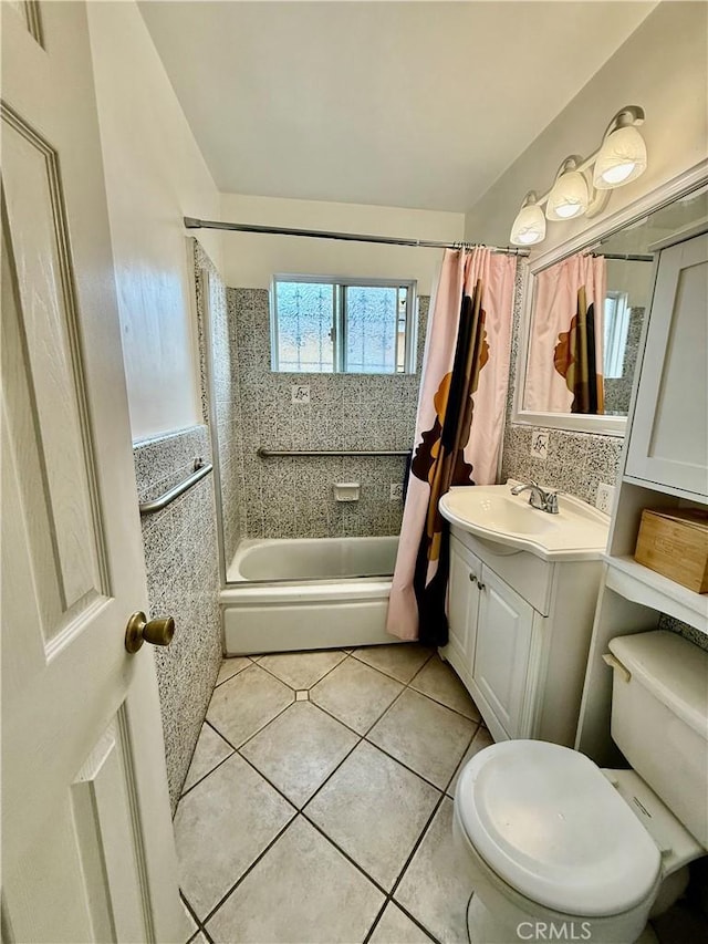 1526 Lakme Ave, Wilmington, CA 90744 - bathroom featuring shower / bath combo with shower curtain, vanity, and tile patterned floors