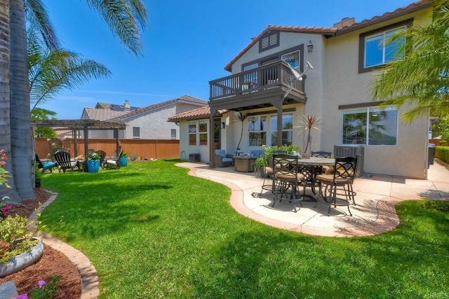 756 River Rock Rd, Chula Vista, CA 91914 - rear view of house featuring a balcony, stucco siding, a pergola, a patio, and a tiled roof