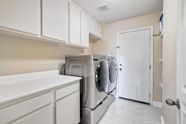 756 River Rock Rd, Chula Vista, CA 91914 - laundry room featuring washer and dryer and cabinet space