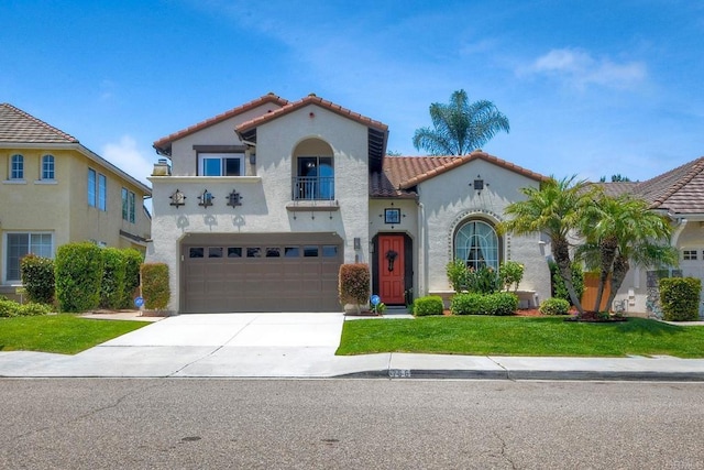 756 River Rock Rd, Chula Vista, CA 91914 - mediterranean / spanish-style home with a tiled roof, a balcony, stucco siding, an attached garage, and concrete driveway