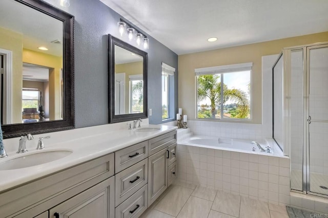 756 River Rock Rd, Chula Vista, CA 91914 - full bath with plenty of natural light, double vanity, a bath, and a shower stall