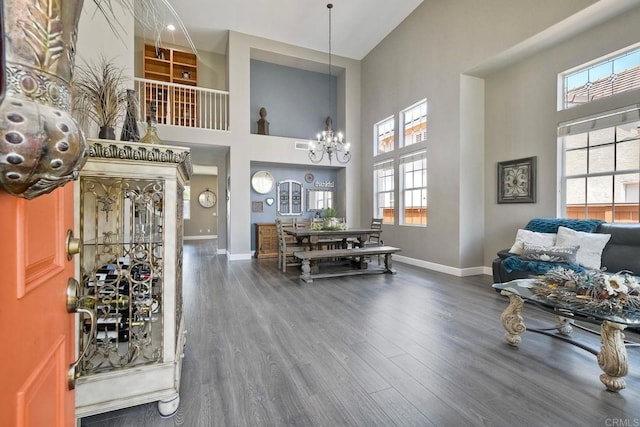 756 River Rock Rd, Chula Vista, CA 91914 - foyer with a towering ceiling, wood finished floors, a chandelier, and plenty of natural light