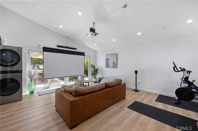 136461/2 Dronfield Ave, Sylmar, CA 91342 - living area with stacked washing machine and dryer, healthy amount of natural light, lofted ceiling, light wood-type flooring, and recessed lighting