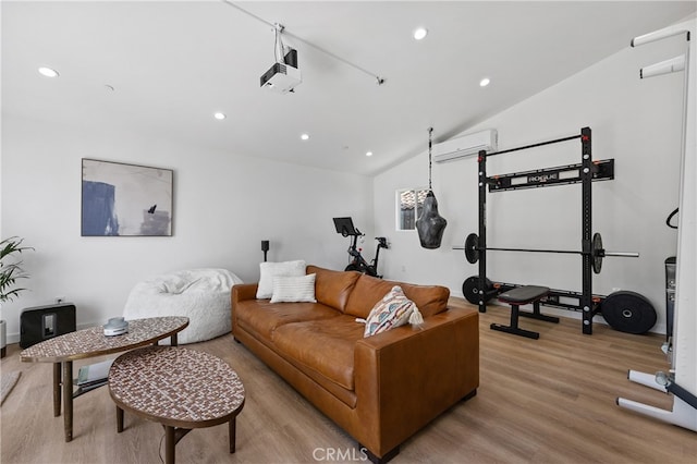 136461/2 Dronfield Ave, Sylmar, CA 91342 - living area with a wall mounted AC, light wood finished floors, recessed lighting, and lofted ceiling