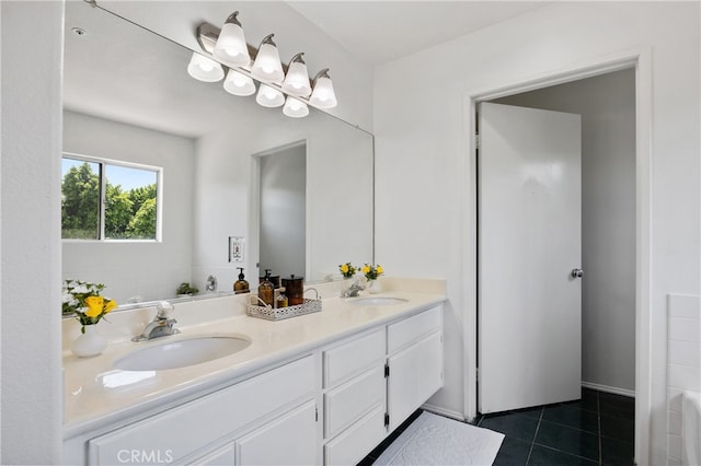 136461/2 Dronfield Ave, Sylmar, CA 91342 - full bath with double vanity, tile patterned flooring, and a tub to relax in
