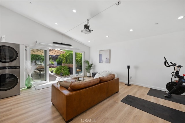 136461/2 Dronfield Ave, Sylmar, CA 91342 - living area featuring estacked washer and dryer, light wood-style flooring, recessed lighting, and high vaulted ceiling
