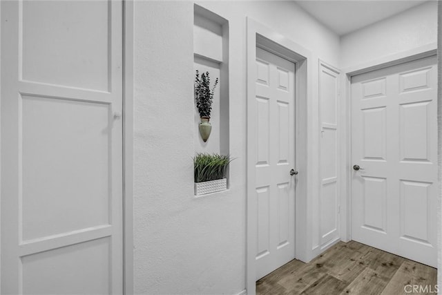 2255 Cota Ave, Long Beach, CA 90810 - corridor featuring wood finished floors and a textured wall