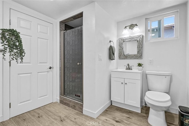 2255 Cota Ave, Long Beach, CA 90810 - full bath with wood finished floors, vanity, and a stall shower