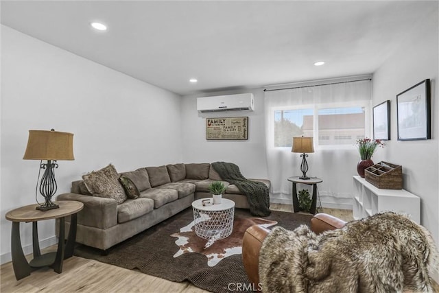 2255 Cota Ave, Long Beach, CA 90810 - living area featuring a wall unit AC, wood finished floors, and recessed lighting