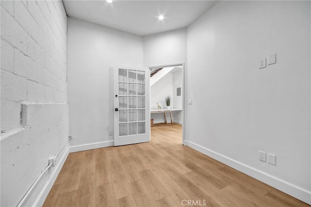 3735 Division St, Los Angeles, CA 90065 - empty room with light wood-type flooring, french doors, and recessed lighting