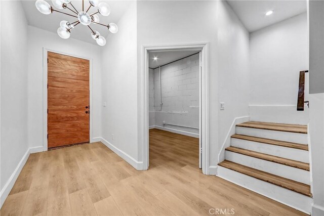 3735 Division St, Los Angeles, CA 90065 - entryway with stairway, light wood-style flooring, a chandelier, and recessed lighting