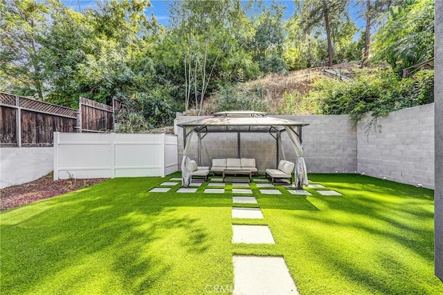 3735 Division St, Los Angeles, CA 90065 - fenced backyard with an outdoor hangout area, a gazebo, and a patio area