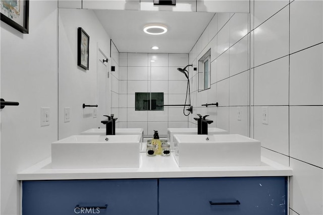 5226 W 20th St, Los Angeles, CA 90016 - bathroom with tile walls, double vanity, and tiled shower