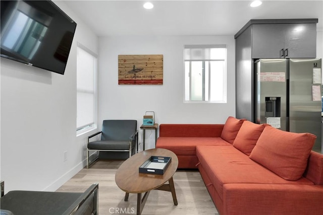 5226 W 20th St, Los Angeles, CA 90016 - living area featuring recessed lighting and light wood-style flooring