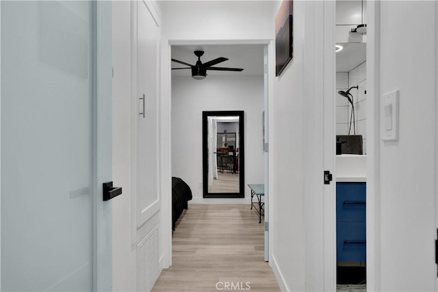5226 W 20th St, Los Angeles, CA 90016 - hall featuring light wood finished floors and baseboards