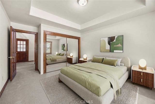 7580 E Martella Ln, Anaheim Hills, CA 92808 - bedroom featuring light carpet, a tray ceiling, and a closet