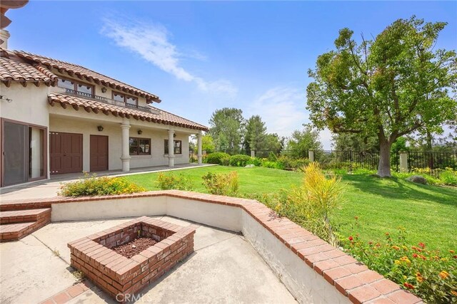 7580 E Martella Ln, Anaheim Hills, CA 92808 - view of patio with a fire pit