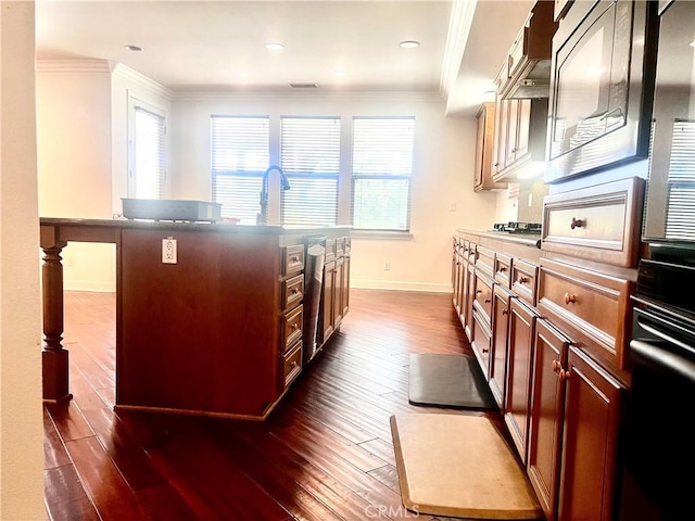 6715 Meriwether Ct, Rancho Cucamonga, CA 91701 - kitchen featuring dark wood-type flooring, crown molding, black oven, a kitchen island, and custom exhaust hood