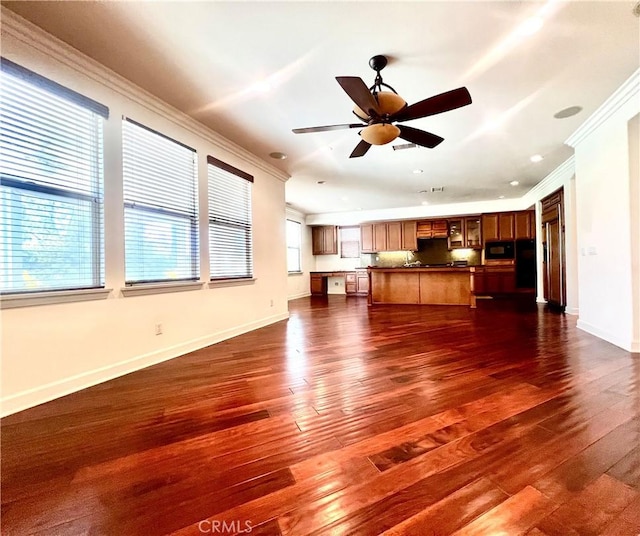 6715 Meriwether Ct, Rancho Cucamonga, CA 91701 - unfurnished living room featuring ornamental molding, dark wood-type flooring, a ceiling fan, and recessed lighting