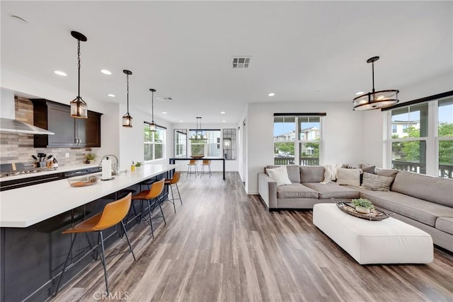 23 Vasto St, Rancho Mission Viejo, CA 92694 - living room with recessed lighting and light wood-style floors