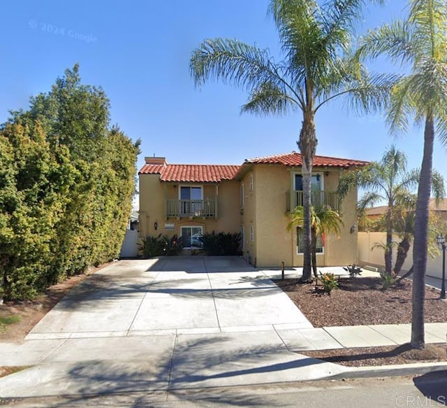 4437 51st St Unit 3, San Diego, CA 92115 - mediterranean / spanish house with stucco siding, concrete driveway, and a tile roof
