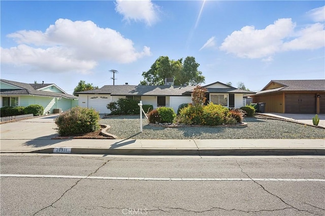 28931 Bradley Rd, Menifee, CA 92586 - view of front of house featuring driveway and a garage