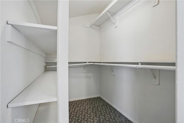 28931 Bradley Rd, Menifee, CA 92586 - spacious closet with tile patterned floors
