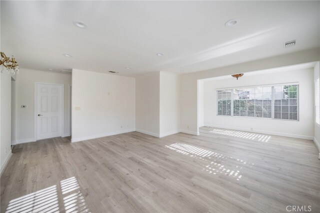 1038 N Columbus Ave, Glendale, CA 91202 - unfurnished living room with light wood-style floors and recessed lighting