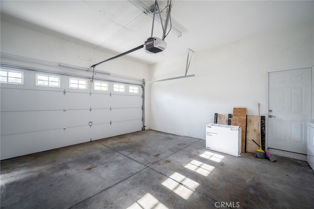 1038 N Columbus Ave, Glendale, CA 91202 - garage featuring a garage door opener and fridge