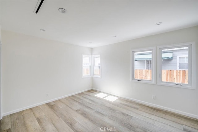 1038 N Columbus Ave, Glendale, CA 91202 - empty room with light wood-style flooring and baseboards