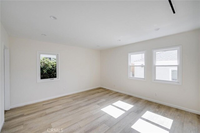 1038 N Columbus Ave, Glendale, CA 91202 - unfurnished room with light wood-style flooring and baseboards
