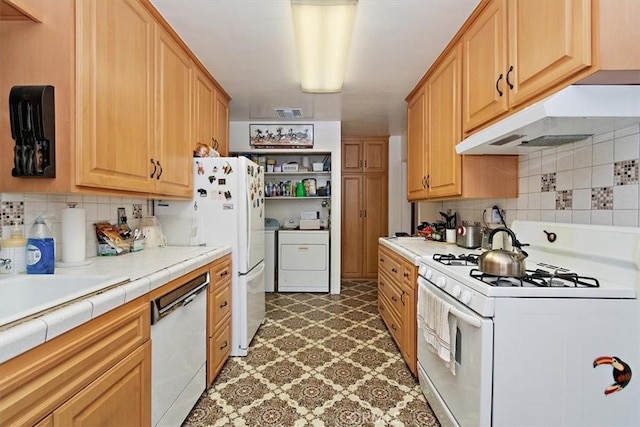 6014 Eckleson St, Lakewood, CA 90713 - kitchen with white appliances, separate washer and dryer, light floors, tasteful backsplash, and open shelves