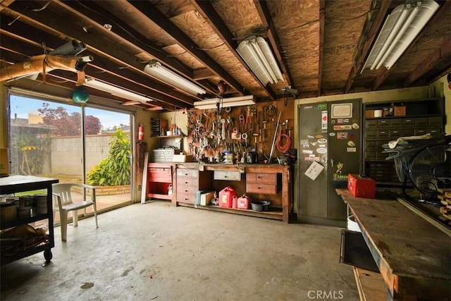 6014 Eckleson St, Lakewood, CA 90713 - misc room featuring a workshop area and unfinished concrete floors