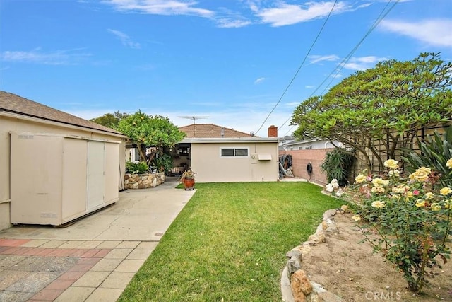 6014 Eckleson St, Lakewood, CA 90713 - fenced backyard featuring an outbuilding