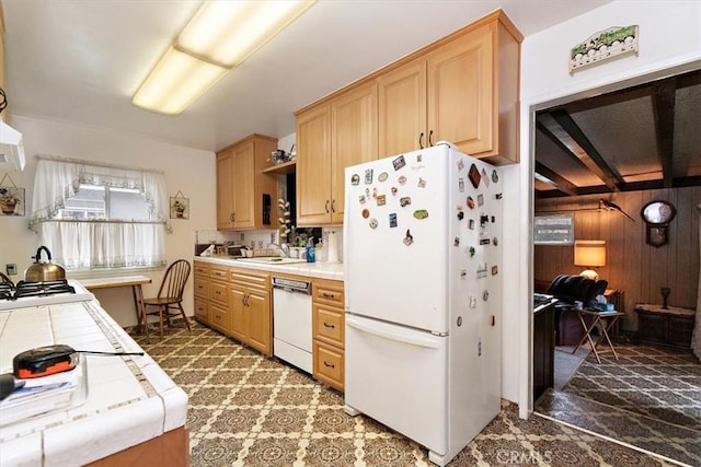 6014 Eckleson St, Lakewood, CA 90713 - kitchen featuring white appliances, tile countertops, light brown cabinets, and wood walls
