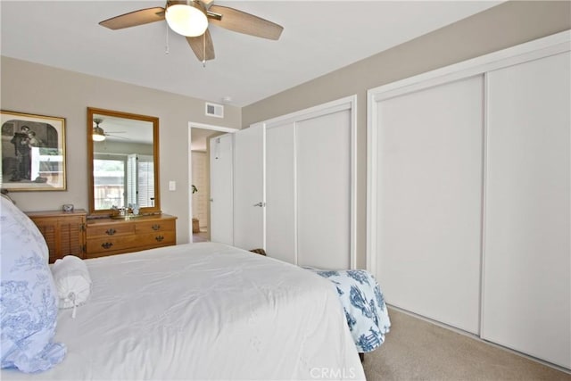 30828 Calle Chueca, San Juan Capistrano, CA 92675 - carpeted bedroom with multiple closets and ceiling fan