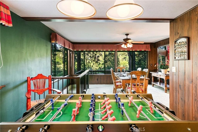 361 Riviera Dr, Lake Arrowhead, CA 92352 - game room with healthy amount of natural light, wooden walls, and a ceiling fan